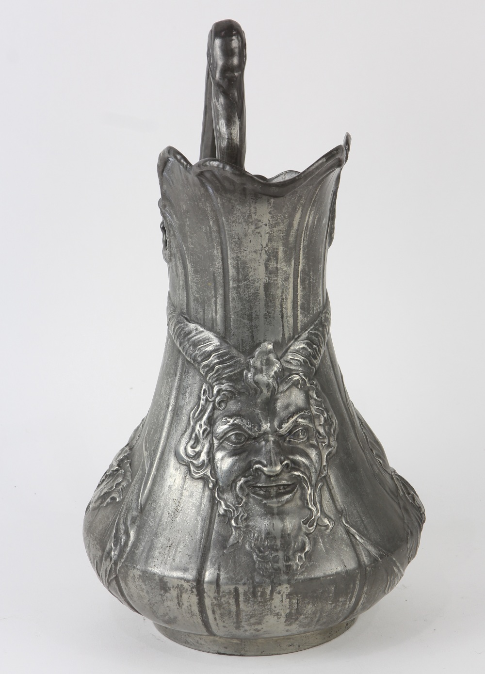Art Nouveau figural pitcher, executed in molded pewter, depicting the head of a horned mystical - Image 2 of 3