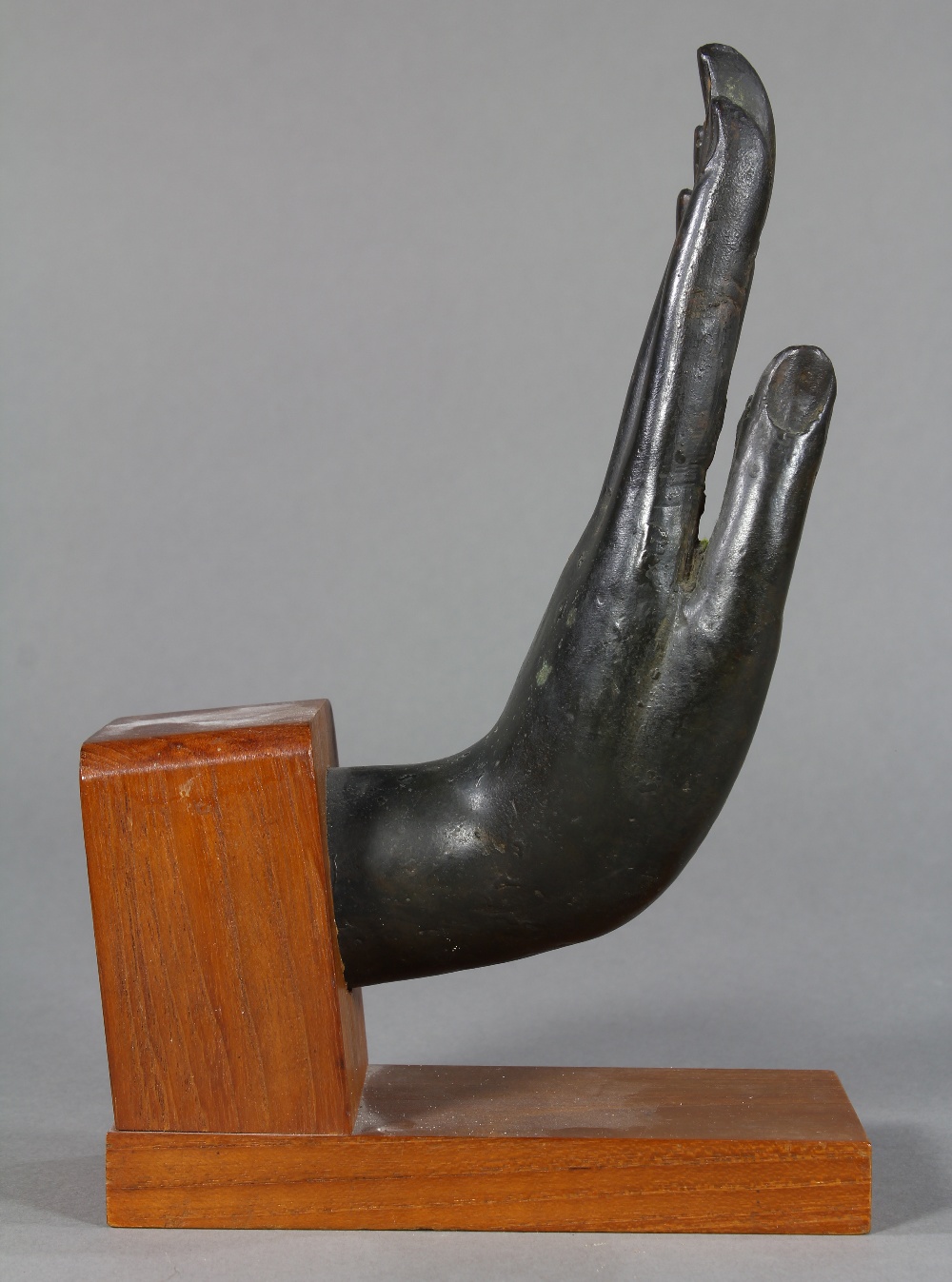 Thai bronze fragment of a hand, possibly from a Buddha, in abhaya mudra, with wood stand, overall: - Image 2 of 3