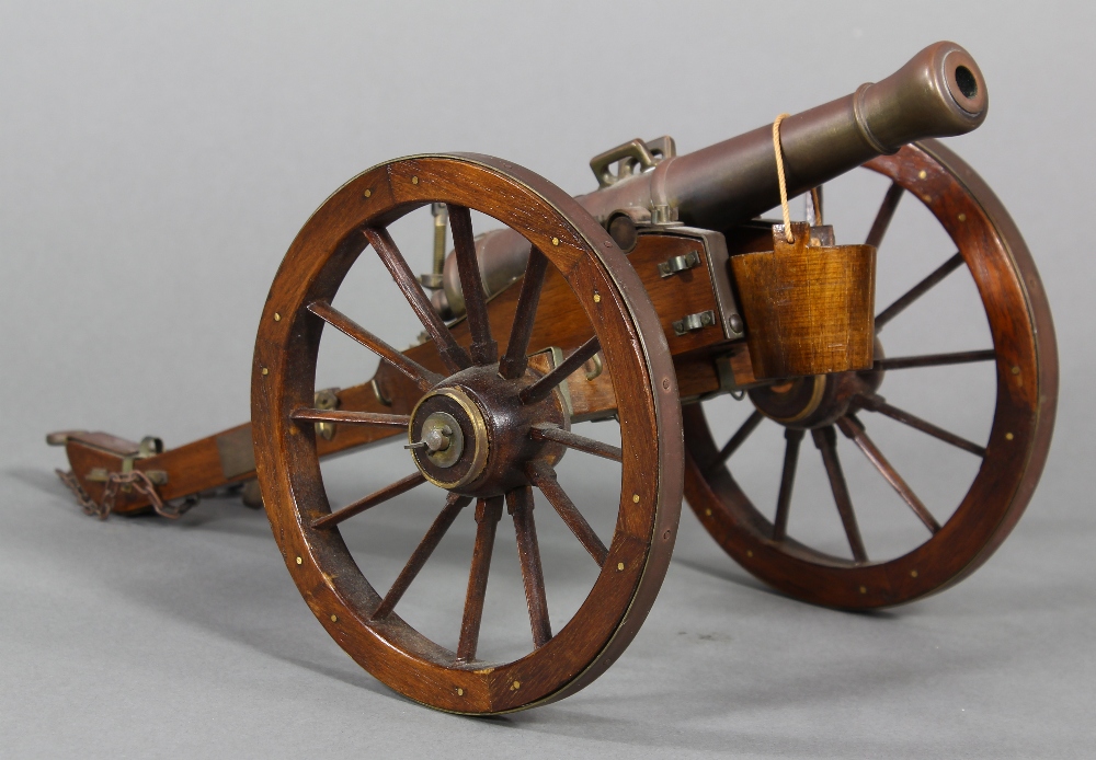 Miniature bronze scale model of a 12-pounder horse drawn artillery cannon, 19th century, the shaft