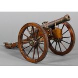 Miniature bronze scale model of a 12-pounder horse drawn artillery cannon, 19th century, the shaft