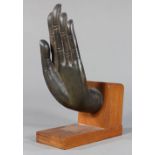 Thai bronze fragment of a hand, possibly from a Buddha, in abhaya mudra, with wood stand, overall: