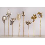 (Lot of 8) Multi-stone, cultured pearl and gold stick pins comprised of one sapphire, freshwater