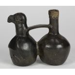 Pre-Columbian Chimu blackware whistling stirrup spout vessel, 100-200 AD., having two chambers in