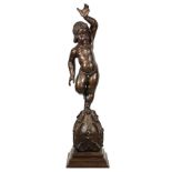 Spanish carved wood figure of a putto, depicted with arm outstretched above head, and rising on a