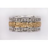 Diamond, 14k yellow and white gold band centering a Greek key motif band in 14k yellow gold,