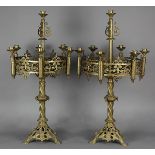 Pair of Continental Gothic Revival gilt candelabra, the 7-light fixture accented with pieced