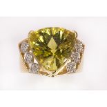 Green quartz, diamond and 14k yellow gold ring centering (1) fancy triangular shape green quartz,
