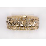 Diamond and 14k gold band featuring a 3.7 mm, rose and white 14k gold, braided band, bordered by (