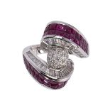 Ruby, diamond and 18k white gold ring designed as a bypass, centering a ball form, accented by (