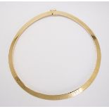 14k yellow gold omega collar the 14k yellow gold 8.0 mm wide, flat omega link is completed by a