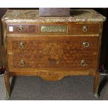 Louis XV style commode circa 1850, having a marble top, above the three drawer case, and rising on