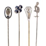 (Lot of 4) Diamond, sapphire, emerald, gold and platinum stick pins comprised of one Art Deco