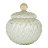 Alfredo Barbini art glass lidded jar, having an ovoid and ribbed form, with flecked gold colored