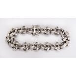 18k white gold bracelet the textured and polished knot link, measures approximately 13.5 mm in