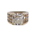 Diamond and 18k yellow gold ring featuring (1) Radiant-cut diamond, weighing approximately 7.90