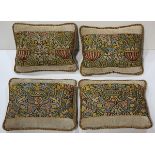 Antique pillow group, each centered with a floral decorated Italian silk needlepoint panel circa