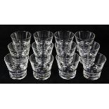 (lot of 12) Baccarat crystal tumblers in the Vega pattern, each having a geometric base with a