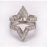 Diamond and platinum guard ring featuring (30) calibre-cut princess-cut diamonds, weighing a total