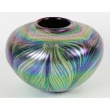 Iridescent art glass vase, of bulbous form having a green, purple and yellow pulled peacock