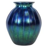 Art glass Blue Aurene vase, having a tapered and ribbed form, signed indistinctly on base, 10"h