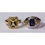 (Lot of 2) Multi-stone, diamond and gold rings including one ring featuring an emerald-cut iolite,