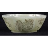 Chinese hardstone lobed brush washer, etched with various flowers heightened in gilt, base with