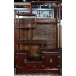 Chinese hardwood curio cabinet, with open shelving above two compartments with hinged doors and a