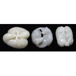 (lot of 3) Chinese hardstone carvings, two each with a pair of recumbent beasts, and one with a pair