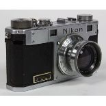 Nikon SLR camera made in occupied Japan, 3"h x 5.75"w x 2.5"d