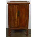 Chinese wooden small cabinet, fronted by hinged double doors and with shelves to the interior, above