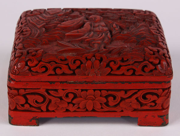 Chinese cinnabar lacquered metal box, the hinged lid with a monk in landscape, the side featuring