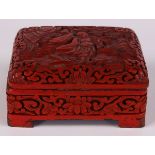 Chinese cinnabar lacquered metal box, the hinged lid with a monk in landscape, the side featuring