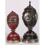 (lot of 2) Faberge style finely detailed enameled eggs including one mounted with medallion