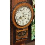 F. B. Edwards, Dudley, hanging wall clock, having an inlaid case with stringing and geometric