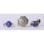 (Lot of 3) Multi-stone, diamond and 14k gold rings comprised of one blue topaz, 14k yellow gold