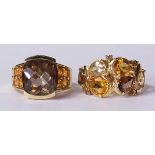 (Lot of 2) Multi-stone and 14k yellow gold rings consisting of one ring, centering (1) faceted top
