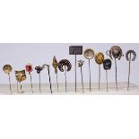 (Lot of 14) Multi-stone, gold, metal and silver stick pins comprised of one sterling Punch