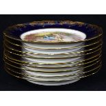 (Lot of 9) German Volkstedt H.P. porcelain chargers, 19th Century, each having a colbalt and gilt