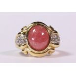 Rhodochrosite, diamond and 14k yellow gold ring featuring (1) oval rhodochrosite cabochon, measuring