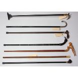 (lot of 7) Vintage walking stick group including five surmounted with figural animal grips; together