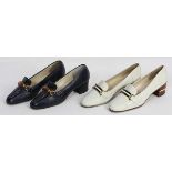 Two pairs of Italian Gucci couture shoes, circa 1975, in white and navy leather, the loafer design