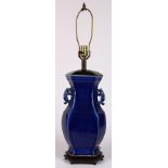 Chinese blue glazed porcelain vase, now mounted as a lamp, with a flattened body and dragon handles,