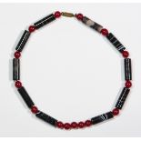 Agate and red stone necklace featuring (10) cylindrical banded agate beads, measuring 1.1" x 0.