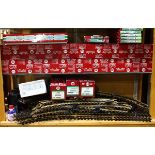 Two shelves of train tracks, including by L.G.B, in various sizes, some having original boxes