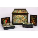 (lot of 5) Russian black lacquered boxes, each decorated with polychrome allegorical reserves, and