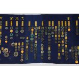 Assortment of Chinese coins, consisting of a textile handscroll attached with various Chinese coins;