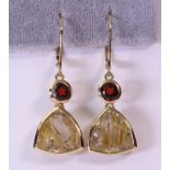 Pair of Rutilated quartz, diamond and 14k yellow gold earrings featuring (2) shield shaped rutilated