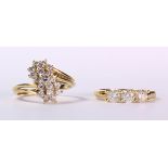 (Lot of 2) Diamond and 14k yellow gold rings comprised of a ring featuring (19) full-cut diamonds,