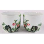 (lot of 2) Chinese enameled porcelain cups, decorated with bamboo, peonies and garden rock, reversed