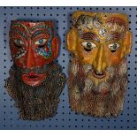 (lot of 2) Mexican wood and fired clay face masks, each dramatically carved and polychrome